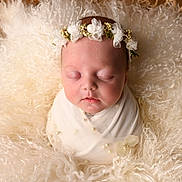Hallie joined the competition — help win amazing prizes! newborn, baby, sleeping, flower_crown, swaddle, pearl, blanket, soft_texture, portrait, closeup, peaceful, infant, cute, headband, wrapped, resting, cozy, skin, face, baby_photo