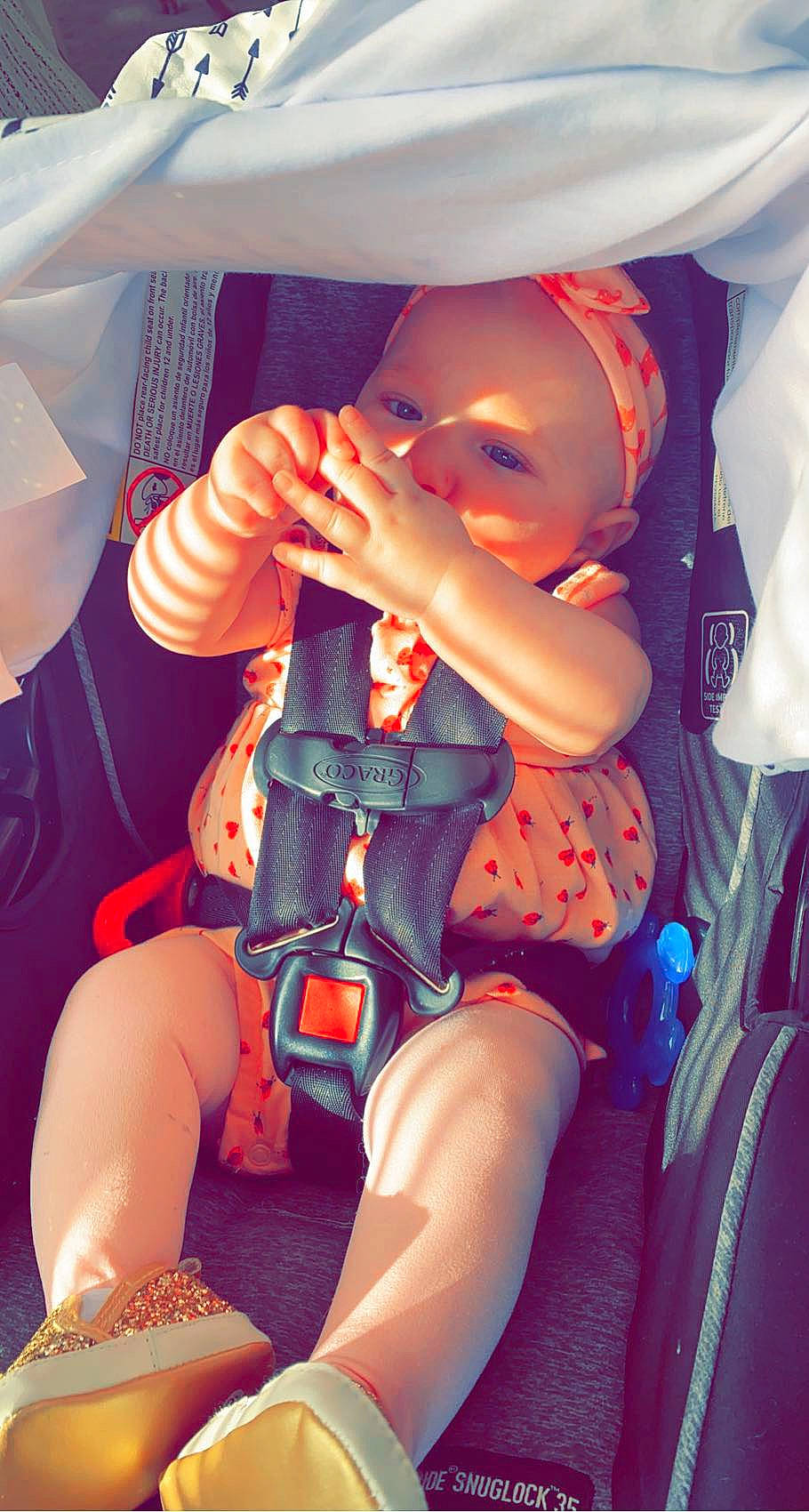 Analeah joined the competition — help win amazing prizes! baby, baby_toddler_clothing, car_seat, child, comfort, electric_blue, finger, fun, happy, human_leg, knee, lap, leg, mouth, nail, orange, person, skin, thigh, thumb