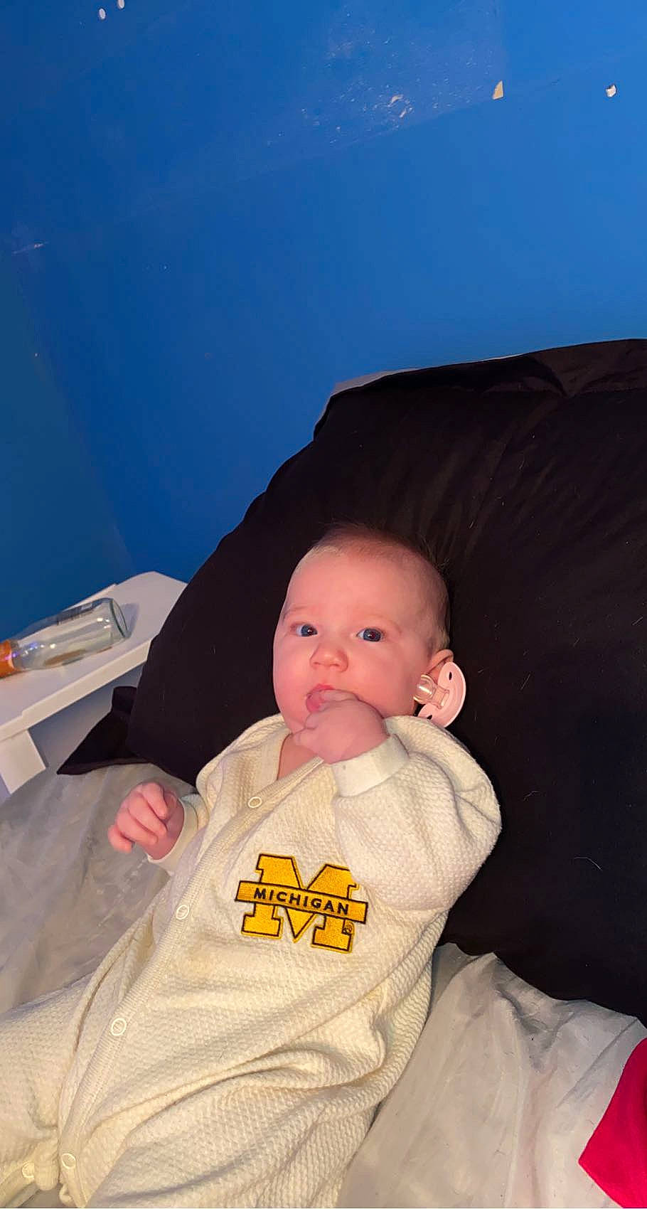 Analeah is registered to the contest to win money with this photo: baby, baby_products, baby_toddler_clothing, cheek, child, comfort, couch, lap, linens, mouth, nose, person, room, sitting, skin, sleeve, thumb, toddler