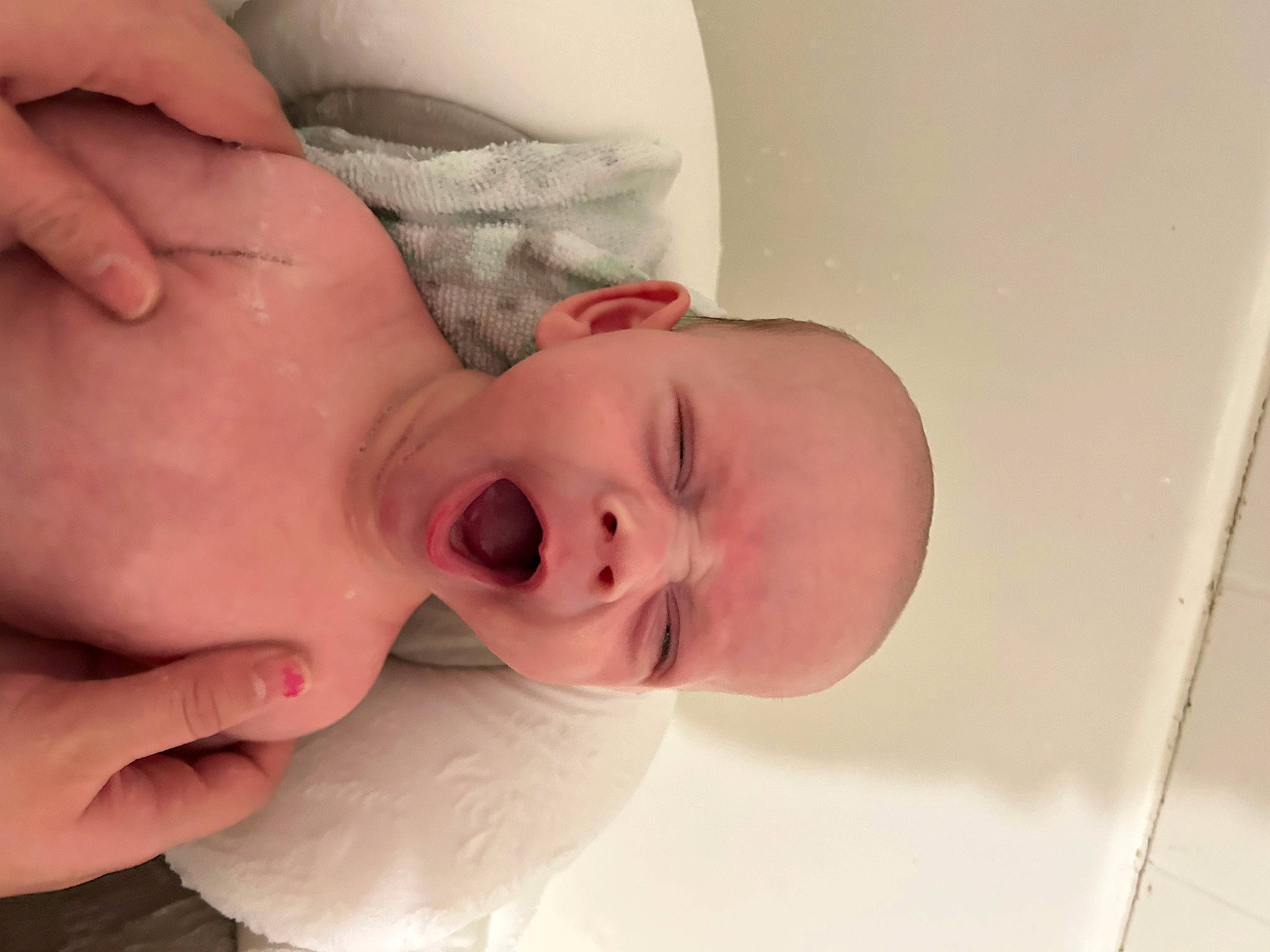 Maverick is registered to the contest to win money with this photo: baby, baby_toddler_clothing, cheek, child, comfort, eye, eyebrow, eyelash, face, finger, gesture, happy, lip, mouth, nail, neck, nose, person, skin, thumb