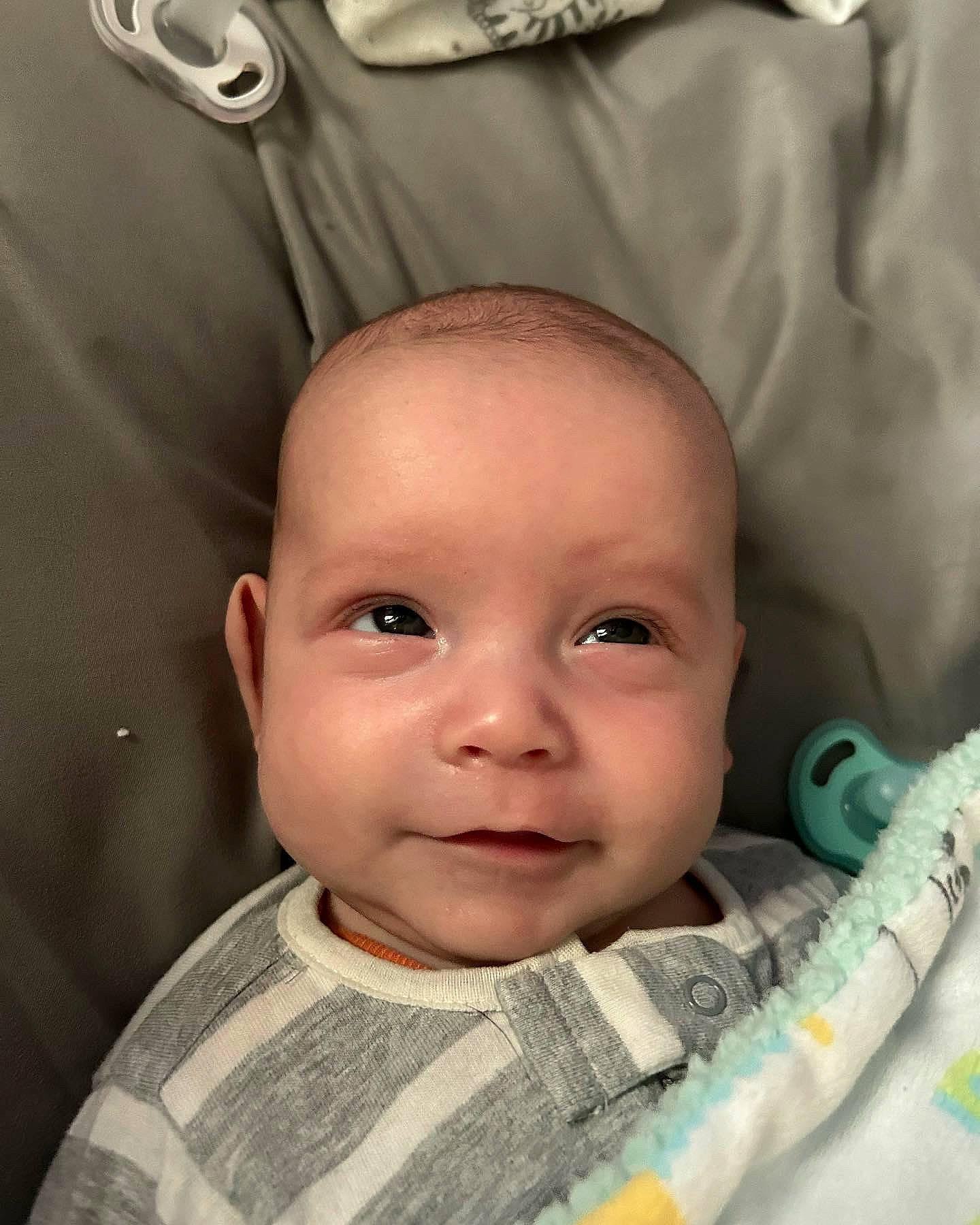 Eugene is registered to the contest to win money with this photo: baby, cheek, chin, comfort, eye, eyebrow, eyelash, face, facial_expression, forehead, happy, head, iris, mouth, nose, person, skin, sleeve, smile, toddler