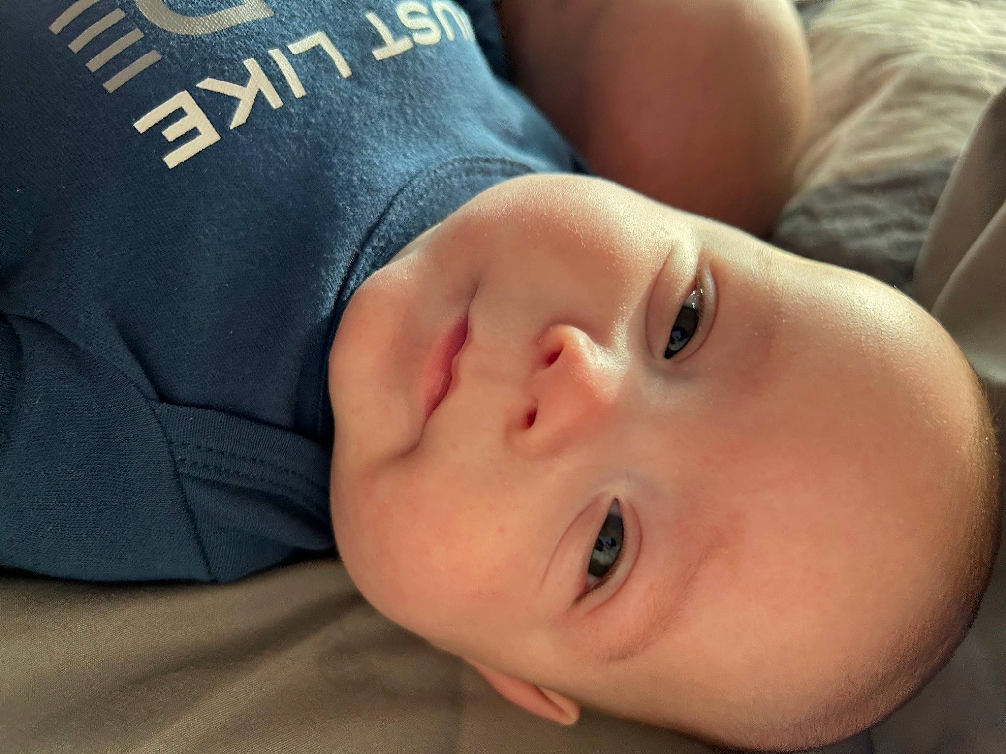 Eugene is registered to the contest to win money with this photo: baby, baby_toddler_clothing, cheek, child, chin, comfort, eyebrow, eyelash, flash_photography, grass, happy, headgear, lip, mouth, nose, person, portrait_photography, skin, sleeve, smile