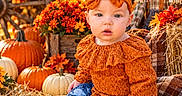 Maddie is registered to the contest to win money with this photo: baby, child, autumn, fall, pumpkins, scarecrow, hay_bale, flowers, chrysanthemums, orange_outfit, lace, hair_bow, blue_jeans, boots, portrait, outdoor, rustic, fall_foliage, harvest, sitting