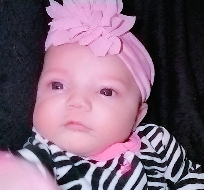 Iriébella is registered to the contest to win money with this photo: baby, baby_toddler_clothing, cap, cheek, clothing, costume_hat, eye, eyelash, happy, head, headband, headgear, headpiece, headwear, magenta, neck, person, pink, sleeve, toddler