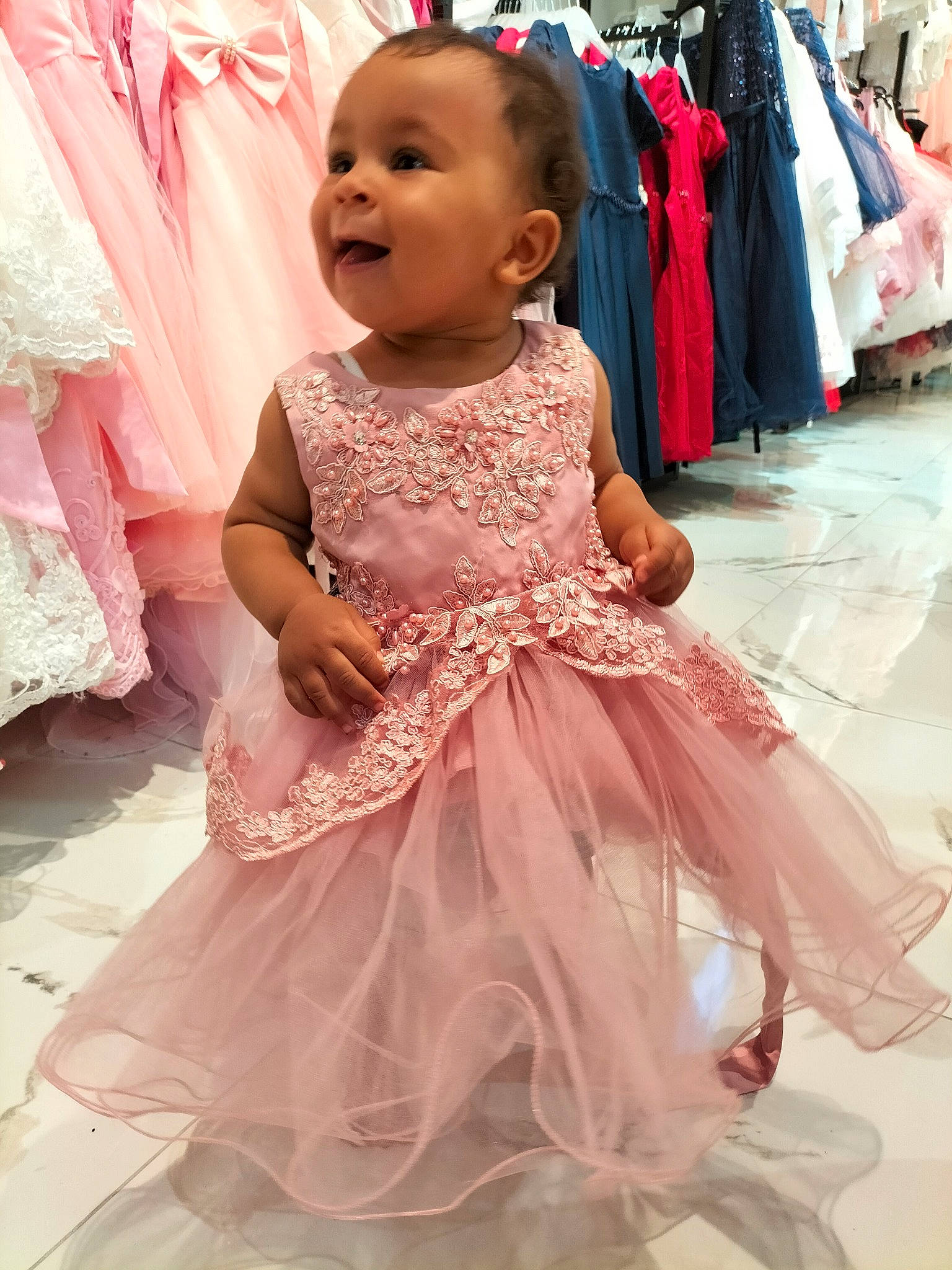 Ayana a rejoint le concours — aidez-le/la à gagner de superbes lots ! baby_toddler_clothing, beauty, child, clothing, day_dress, dress, embellishment, facial_expression, fashion, fashion_design, fun, gown, happy, headgear, magenta, person, photograph, pink, skin, smile