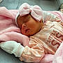 Daleyza joined the competition — help win amazing prizes! baby, bed, blanket, child, clothing, comfort, cozy, cute, headwear, indoors, infant, mittens, newborn, peaceful, pink_bow, portrait, resting, sleep, sleeping, soft