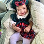 Daleyza joined the competition — help win amazing prizes! baby, blanket, bow, car_seat, child, clothing, cozy, cute, happy, hat, indoors, infant, person, plaid, portrait, seat, smile, soft_texture, warm, white_tights