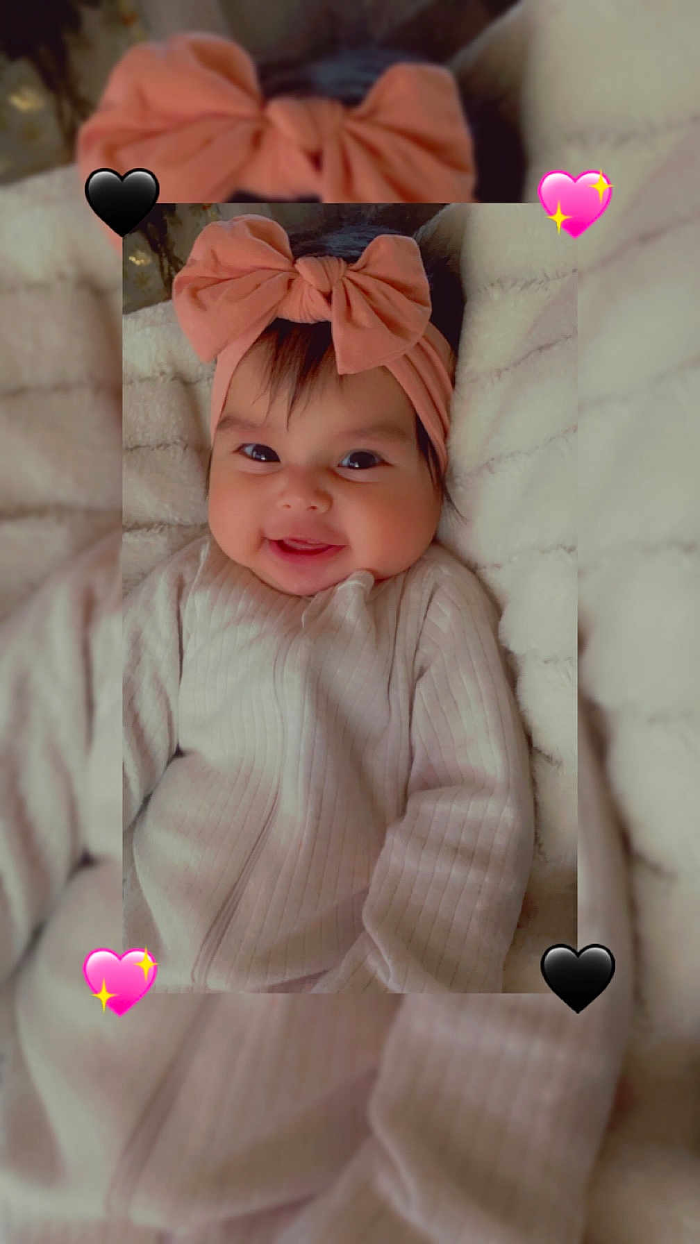 Daleyza joined the competition — help win amazing prizes! baby, infant, smiling, headband, bow, cute, cozy, blanket, soft, fuzzy, clothing, portrait, child, happy, indoors, face, person, heart_emoji, pink, black