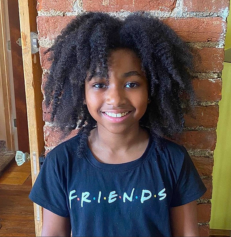 Fatinah is registered to the contest to win money with this photo: afro, black_hair, face, forehead, hair, hairstyle, jheri_curl, joy, lace_wig, long_hair, nose, person, smile