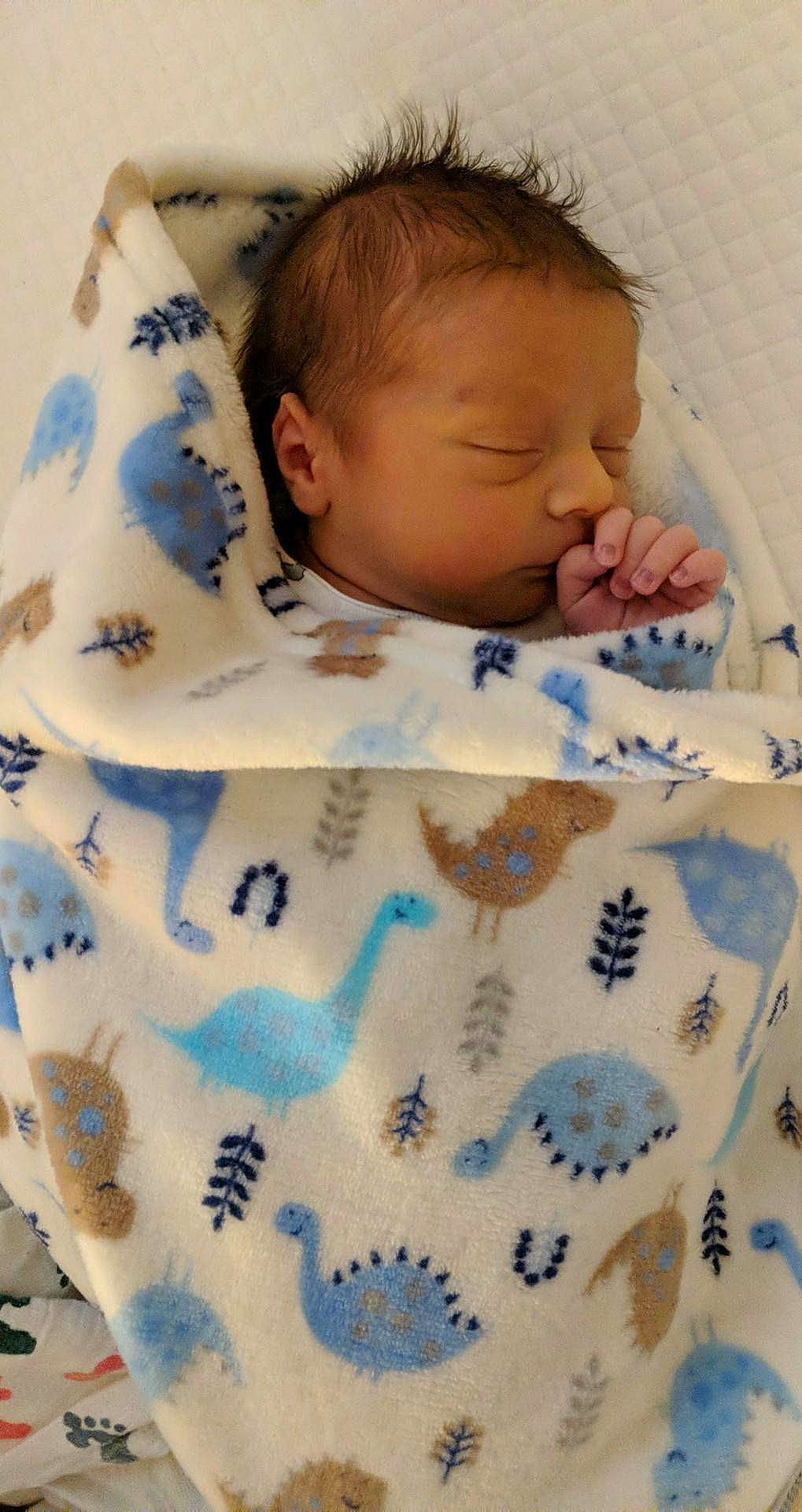 Evan is registered to the contest to win money with this photo: baby, baby_products, baby_safety, baby_sleeping, baby_toddler_clothing, bed_sheet, bedding, bedtime, cheek, child, comfort, linens, pattern, person, product, room, skin, sleeve, textile, toddler