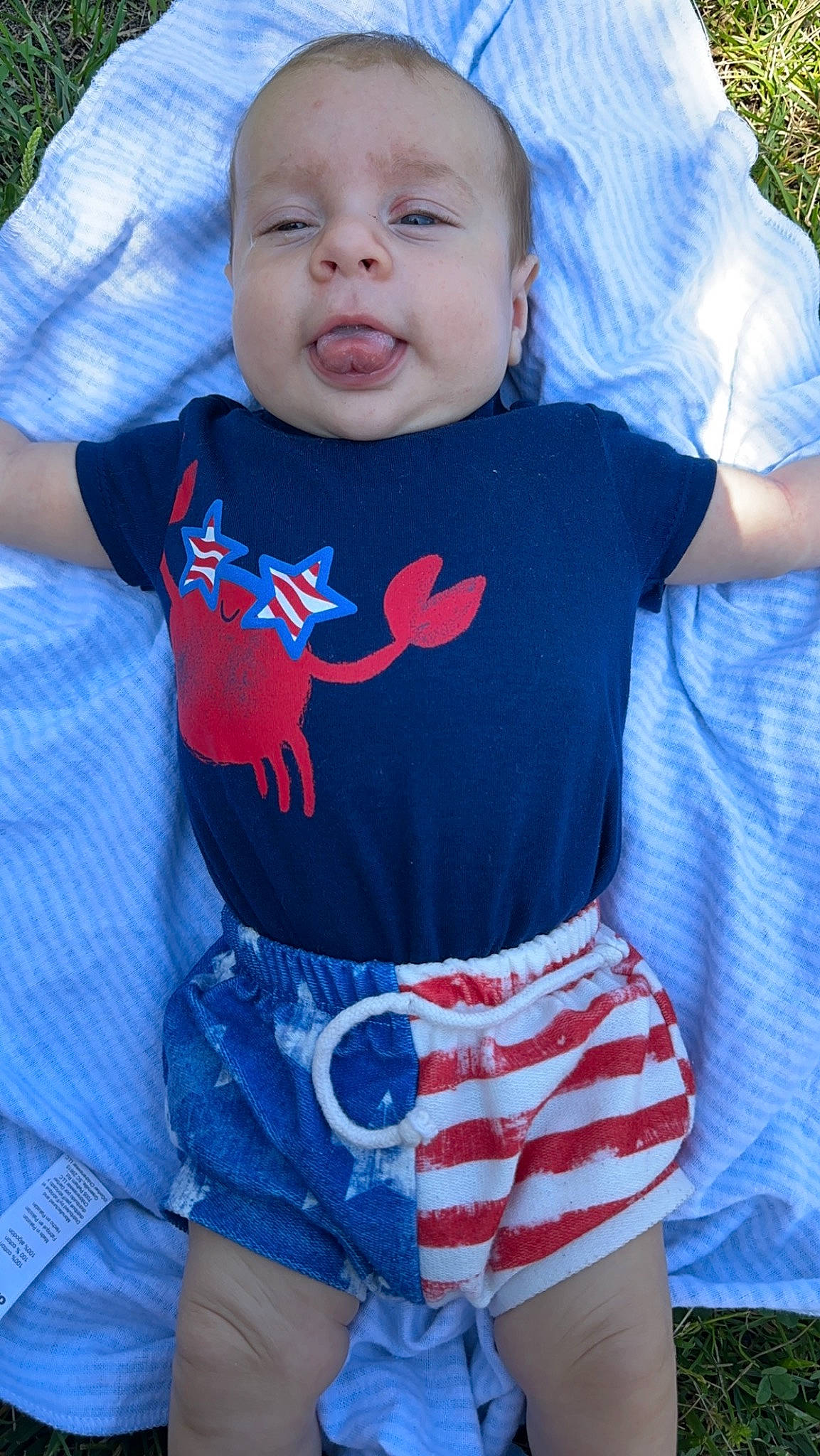 Zaxtyn is registered to the contest to win money with this photo: azure, baby, baby_toddler_clothing, blue, child, cool, electric_blue, face, happy, head, pattern, person, sleeve, smile, spider_man, standing, t_shirt, textile, toddler, waist