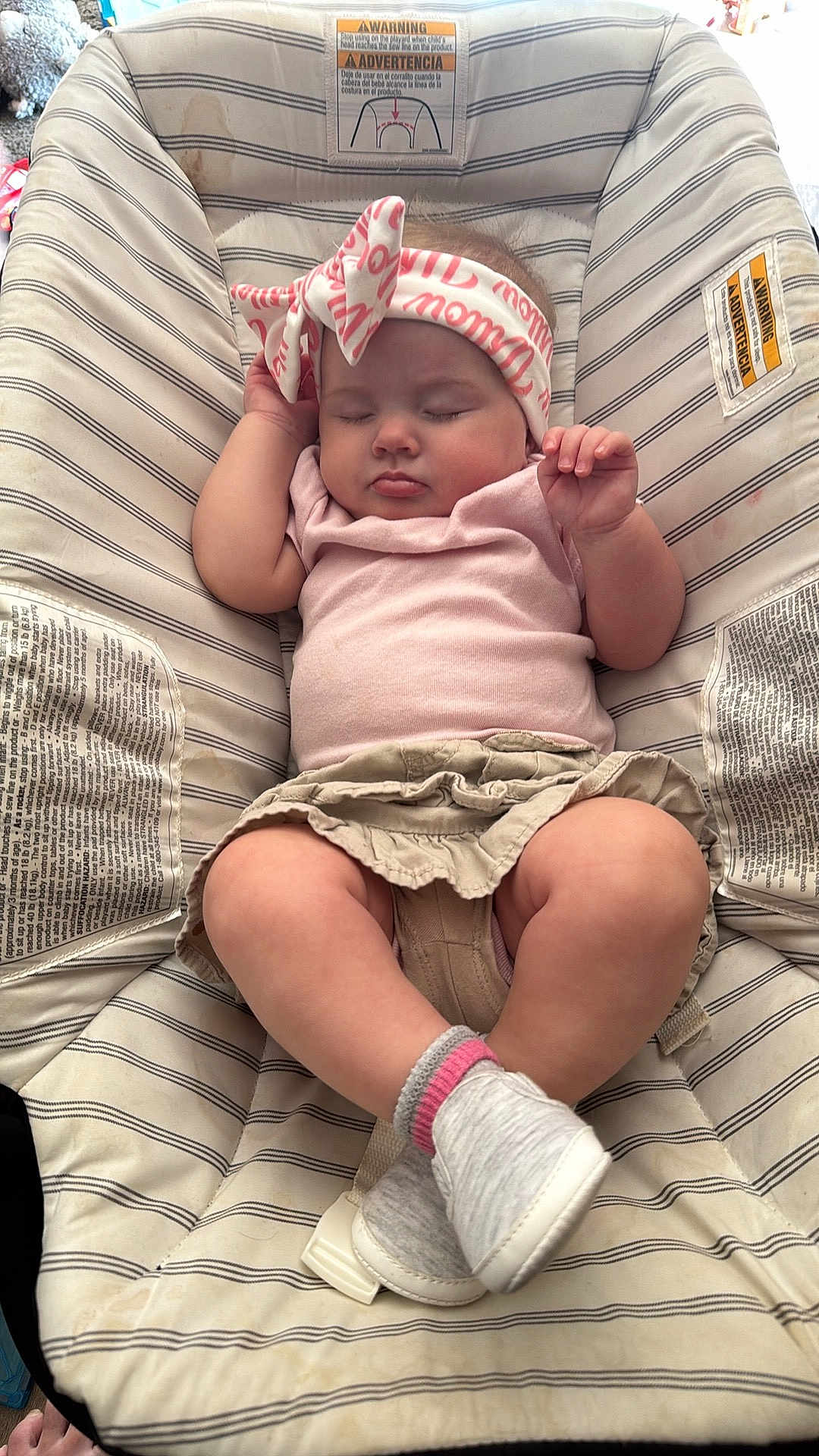 Willow joined the competition — help win amazing prizes! baby, sleeping, headband, bow, pink_clothing, skirt, baby_seat, striped_pattern, warning_label, socks, crossed_legs, infant, cute, indoors, child, resting, soft_fabric, comfortable, peaceful, small