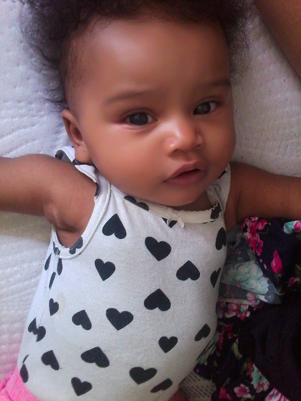 Yuri is registered to the contest to win money with this photo: baby, baby_toddler_clothing, cheek, child, design, lip, nose, pattern, person, pink, skin, toddler