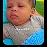 Ryker joined the competition — help win amazing prizes! baby, blanket, blue_blanket, child, clothing, cute, daylight, expression, face, greenery, head, infant, outdoor, person, photography, portrait, relaxed, sitting, skin, young