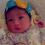 Amara joined the competition — help win amazing prizes! baby, blanket, blue, child, closeup, clothing, cute, face, floral, flower, hand, headband, infant, lying, newborn, pattern, portrait, skin, soft, yellow