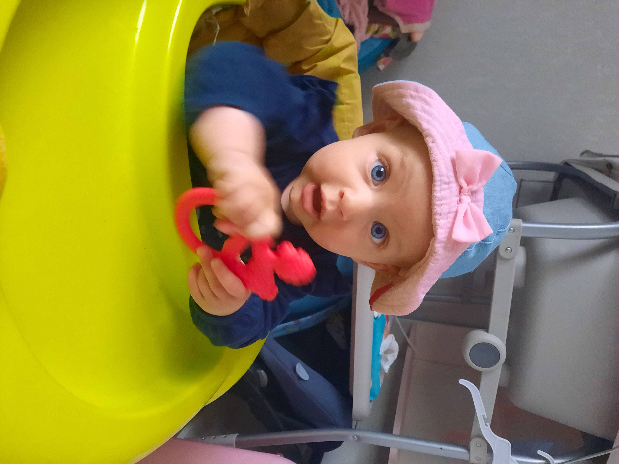 Aneïa participe au concours pour gagner de l'argent avec cette photo : animation, auto_part, baby, baby_products, baby_toys, car_seat, chair, child, doll, fun, happy, headwear, leisure, person, plastic, play, recreation, room, sitting, surprise