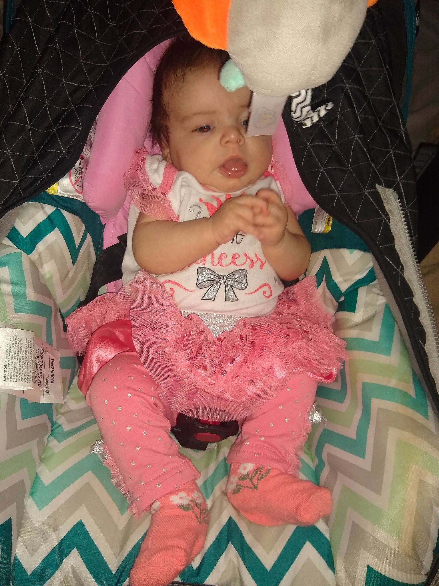 Raylynn joined the competition — help win amazing prizes! baby, baby_products, baby_toddler_clothing, beauty, cheek, child, comfort, eye, fun, happy, iris, lap, leg, pattern, person, pink, sitting, skin, sleeve, sock