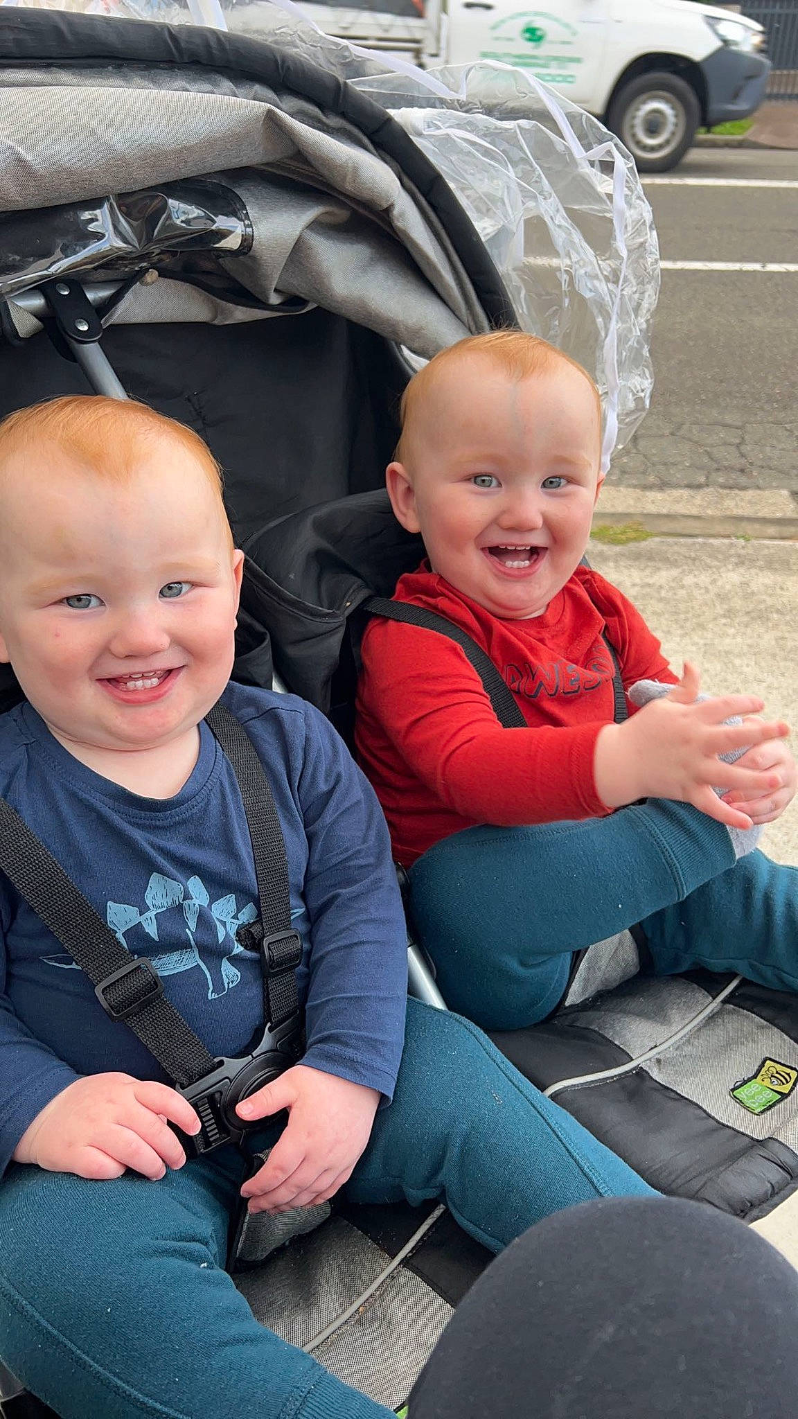 Hunter is registered to the contest to win money with this photo: baby, baby_toddler_clothing, black, child, event, facial_expression, fun, grass, happy, joy, lap, leisure, person, product, sitting, skin, smile, t_shirt, tire, toddler