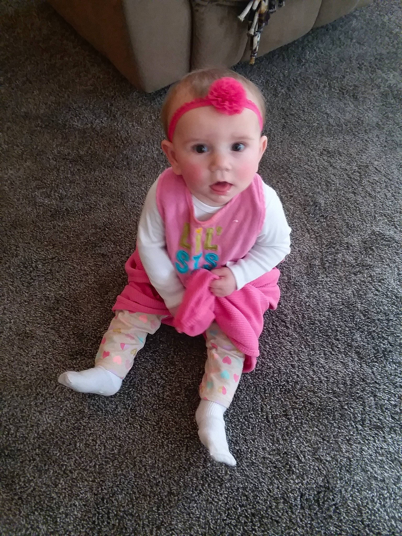 Caitlin is registered to the contest to win money with this photo: baby, cheek, child, person, pink, shoe, skin, toddler