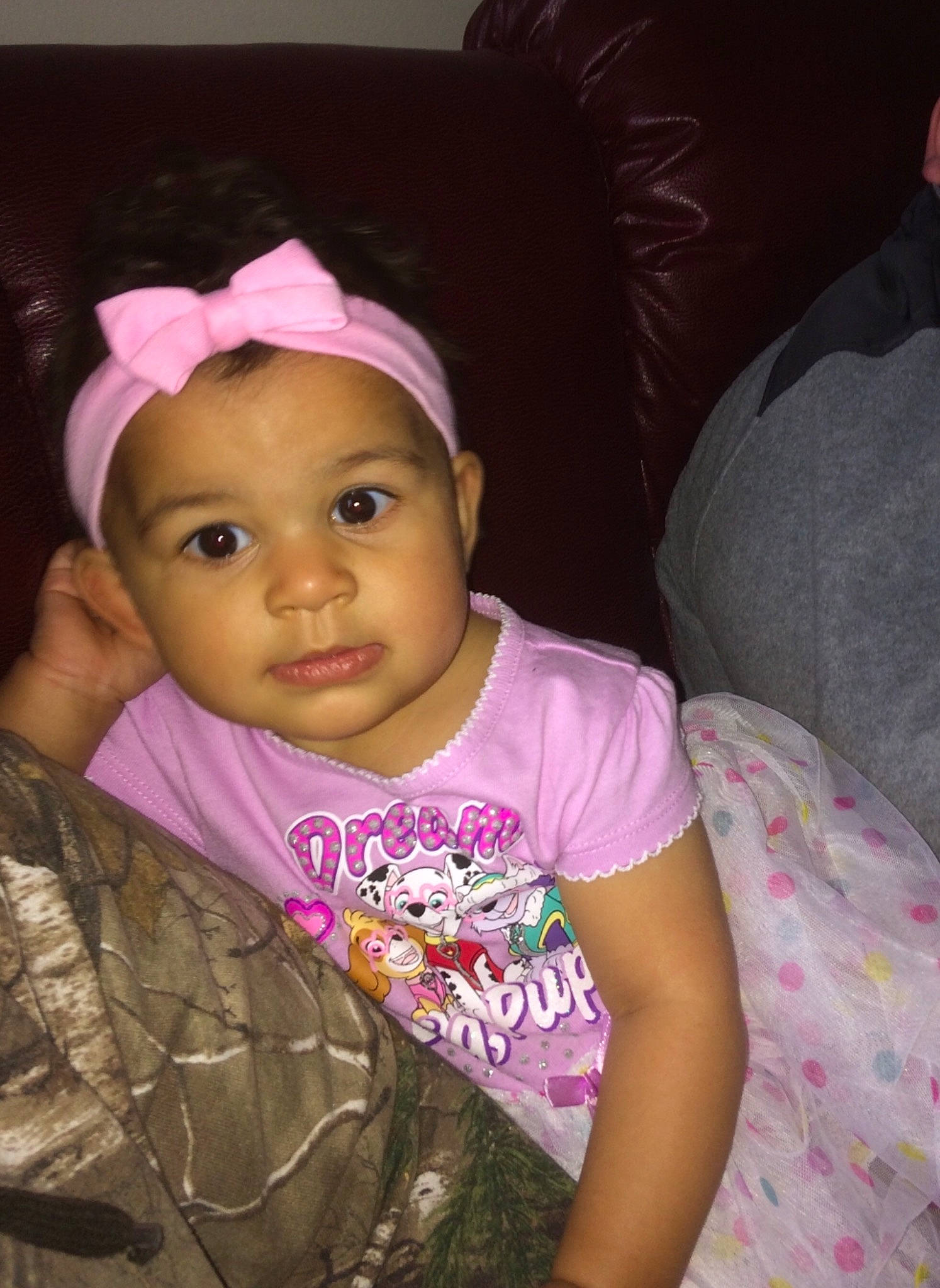 Violet is registered to the contest to win money with this photo: baby, cheek, child, daughter, eye, face, forehead, fun, hair_accessory, happy, head, headgear, lip, party, people, person, pink, skin, smile, toddler