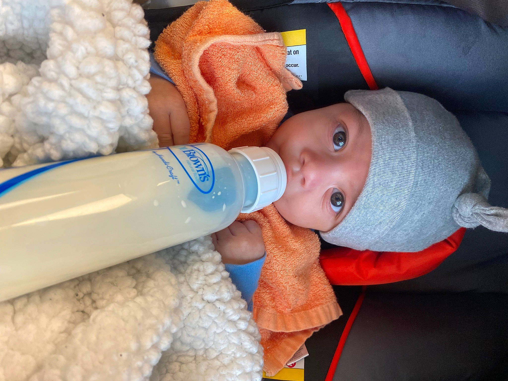 Emilio joined the competition — help win amazing prizes! baby, baby_bottle, baby_products, baby_toddler_clothing, bottle, bottled_water, child, comfort, drinking_water, drinkware, face, finger, headwear, mineral_water, nail, person, plastic, plastic_bottle, product, skin