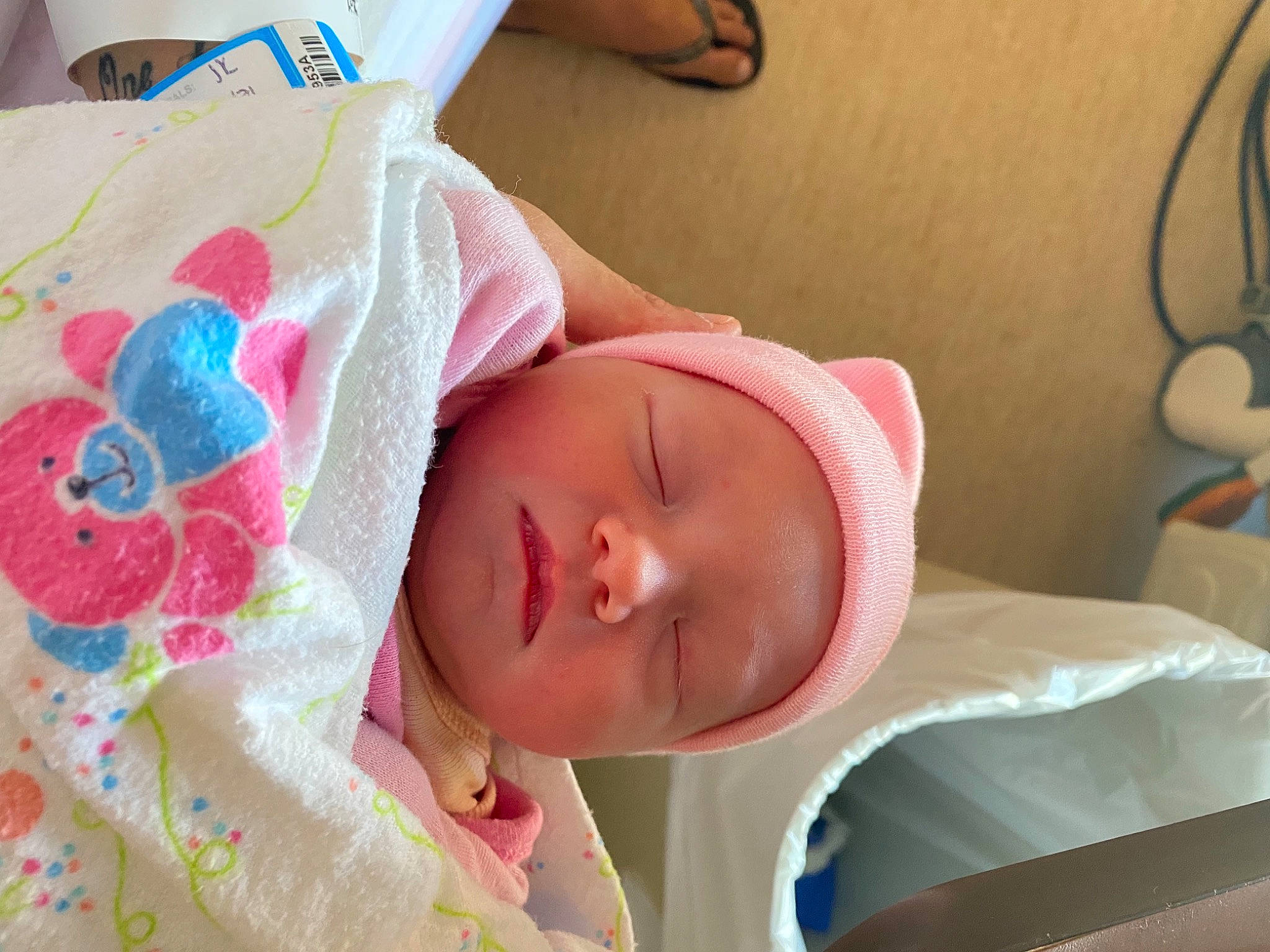 Savanna is registered to the contest to win money with this photo: baby, baby_products, baby_sleeping, baby_toddler_clothing, bedtime, cheek, child, comfort, eyelash, facial_expression, happy, hat, head, headwear, linens, nap, nose, person, room, skin