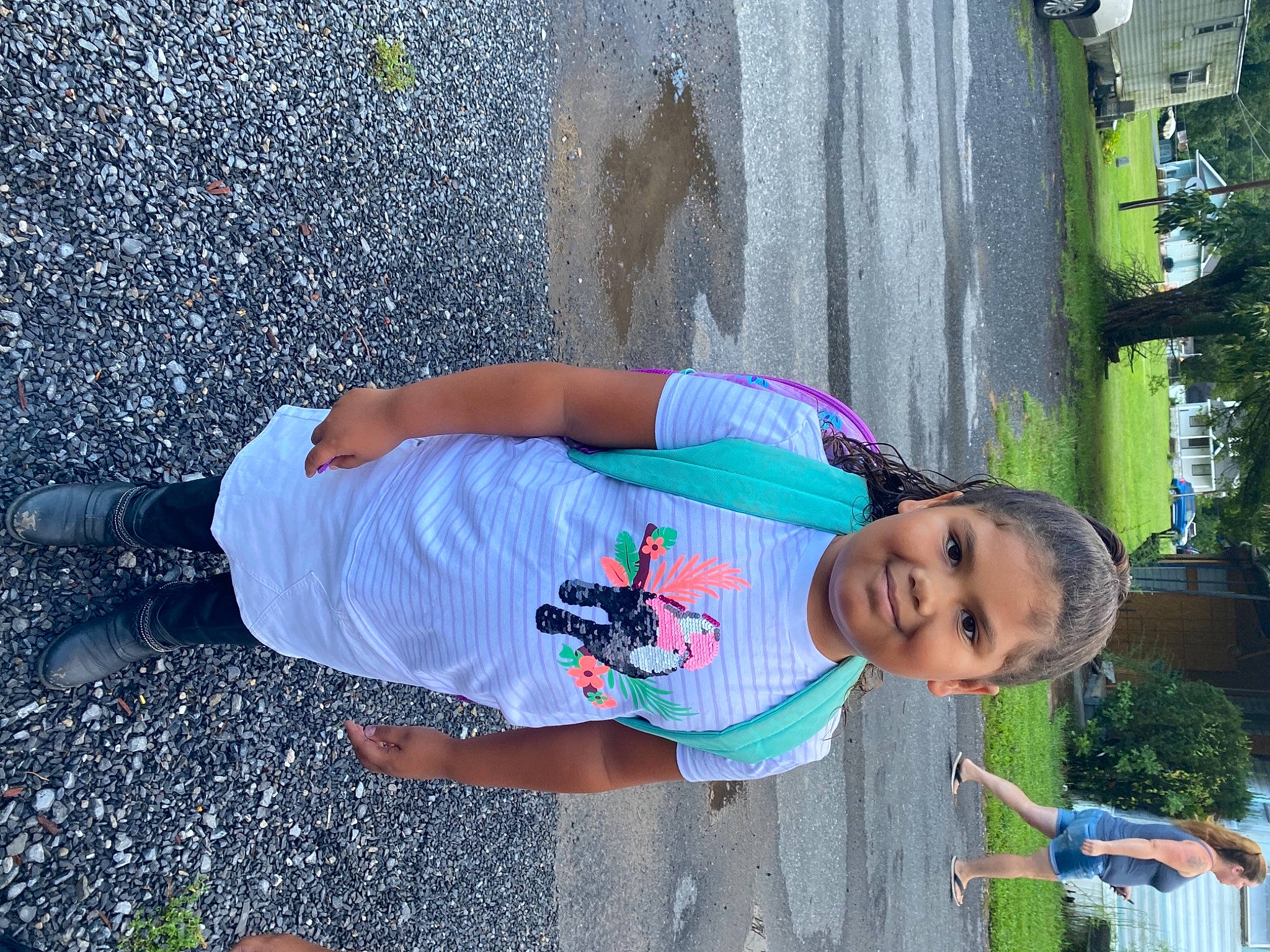 Laila is registered to the contest to win money with this photo: asphalt, child, electric_blue, fun, grass, happy, human_leg, joy, leisure, person, plant, public_space, recreation, red, shorts, street_fashion, t_shirt, thigh, toddler, tree