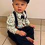 Hugo participe au concours pour gagner de l'argent avec cette photo : toddler, child, boy, hat, cap, suspenders, bow_tie, shirt, pants, barefoot, floor, tiles, indoor, portrait, sitting, cute, curious, fashion, young_child, person
