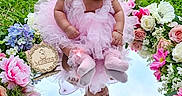 Adeleine is registered to the contest to win money with this photo: baby, infant, pink_dress, headband, flower_wreath, mirror, reflection, outdoor, grass, flowers, tutu, fairy_wings, cute, portrait, child, nature, socks, adorable, garden, spring
