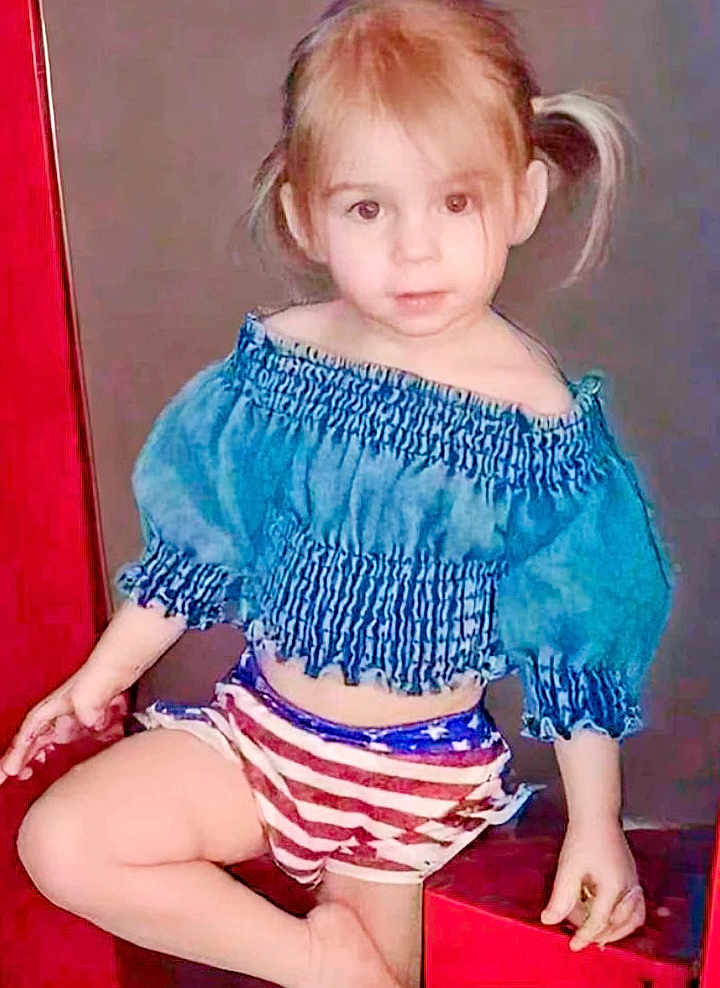 Izabella is registered to the contest to win money with this photo: blouse, bodypart, child, clothing, costume, dress, face, female, finger, girl, hair, hand, head, person, photography, portrait, shorts, sitting, skirt, sleeve