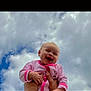 Maizey is registered to the contest to win money with this photo: baby, child, smiling, pink_clothing, hands, sky, clouds, outdoor, portrait, happy, cute, infant, one_person, face, joy, playful, holding, bright, daylight, people