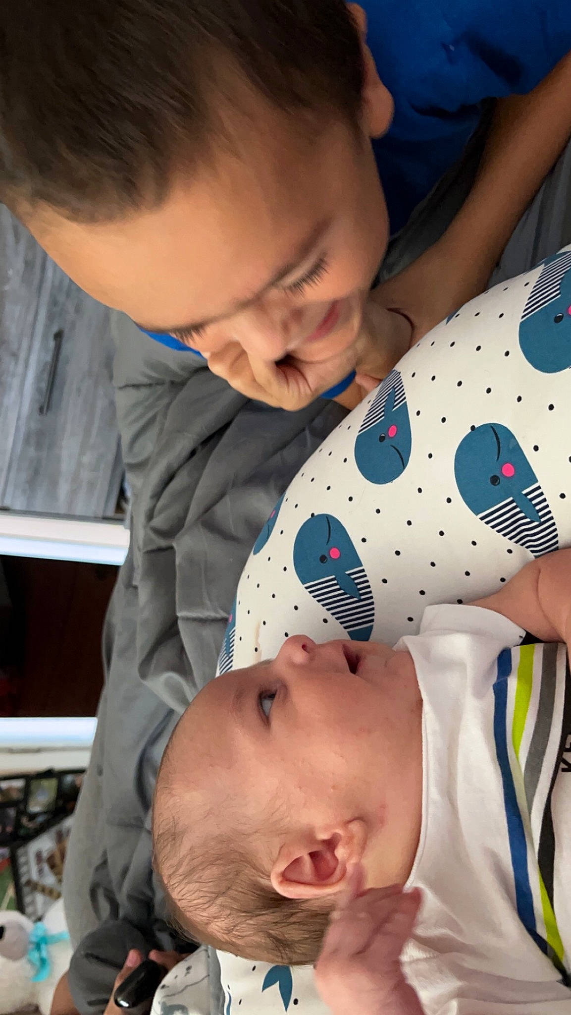 Cameron is registered to the contest to win money with this photo: baby, baby_products, baby_sleeping, baby_toddler_clothing, blue, cheek, child, comfort, eyelash, fun, happy, head, iris, mouth, nose, organ, pattern, person, skin, toddler