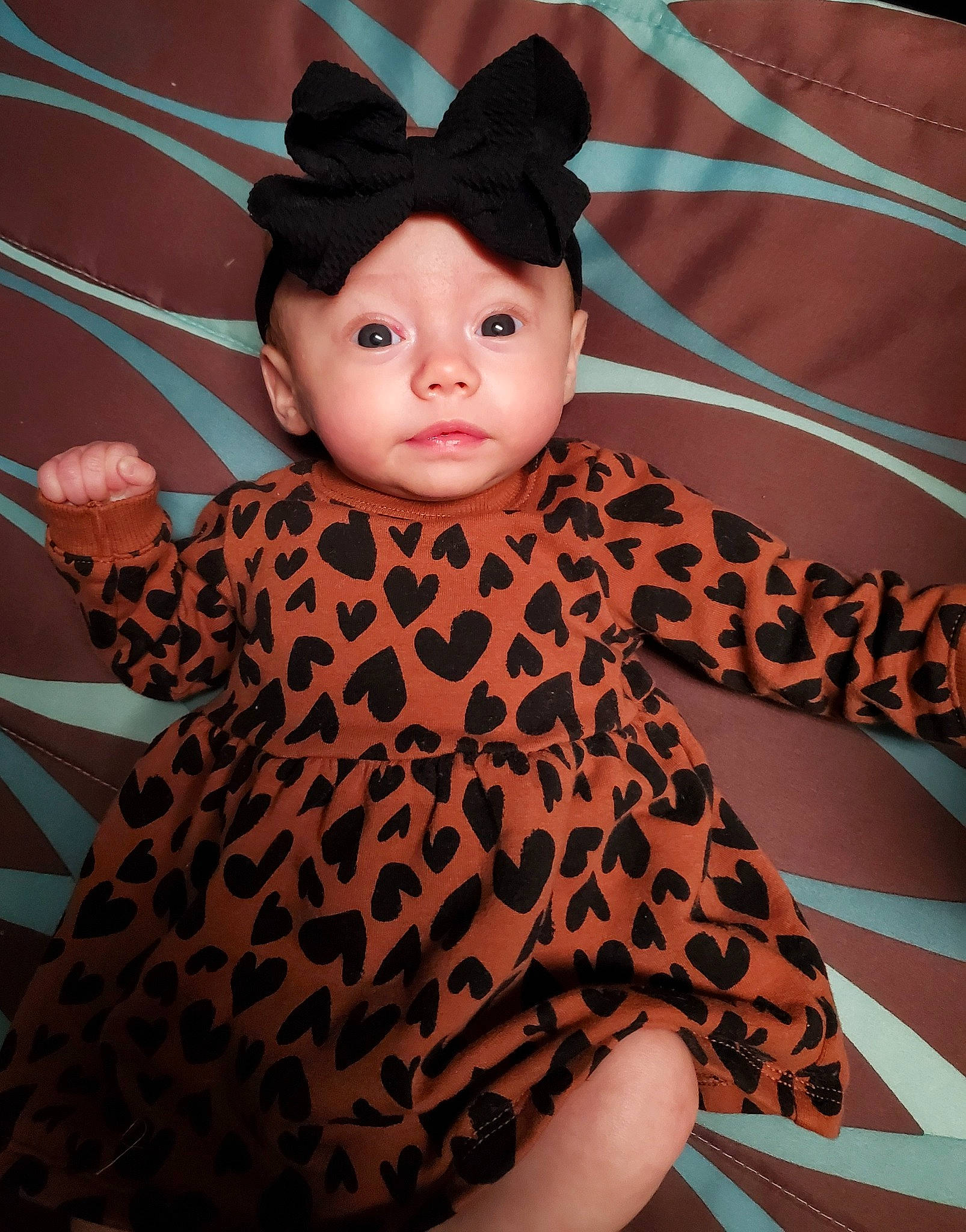 Lydia joined the competition — help win amazing prizes! baby_toddler_clothing, doll, dress, eye, eyelash, fashion_accessory, fawn, fur, hairstyle, head, headgear, headwear, human_body, orange, pattern, person, pink, skin, sleeve, stuffed_toy