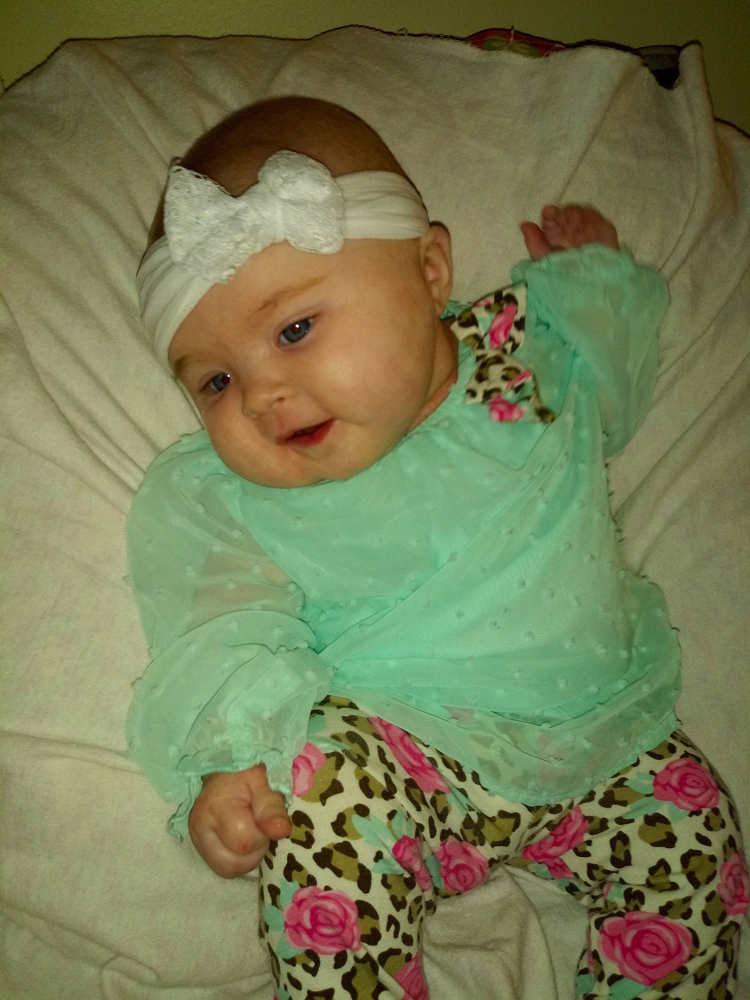 Ensley is registered to the contest to win money with this photo: baby, baby_products, baby_toddler_clothing, cheek, child, hair_accessory, headgear, person, pink, product, skin, textile, toddler