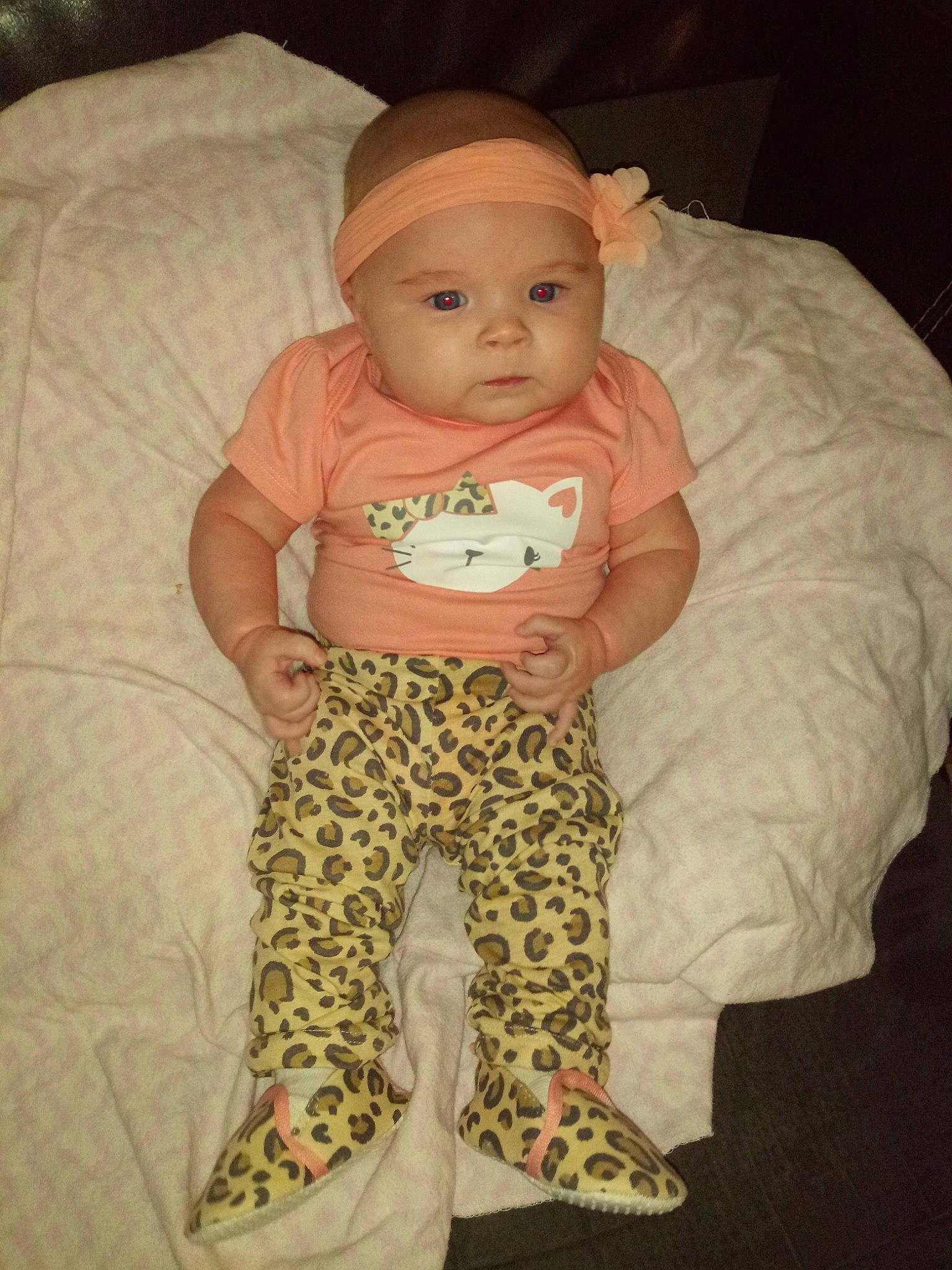 Ensley is registered to the contest to win money with this photo: baby, baby_products, baby_toddler_clothing, cheek, child, head, pajamas, person, sitting, skin, smile, toddler