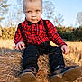 child, toddler, boy, plaid_shirt, bow_tie, suspenders, haystack, field, outdoor, sunny, grass, trees, casual, cute, portrait, shoes, fall, nature, young_child, fashion