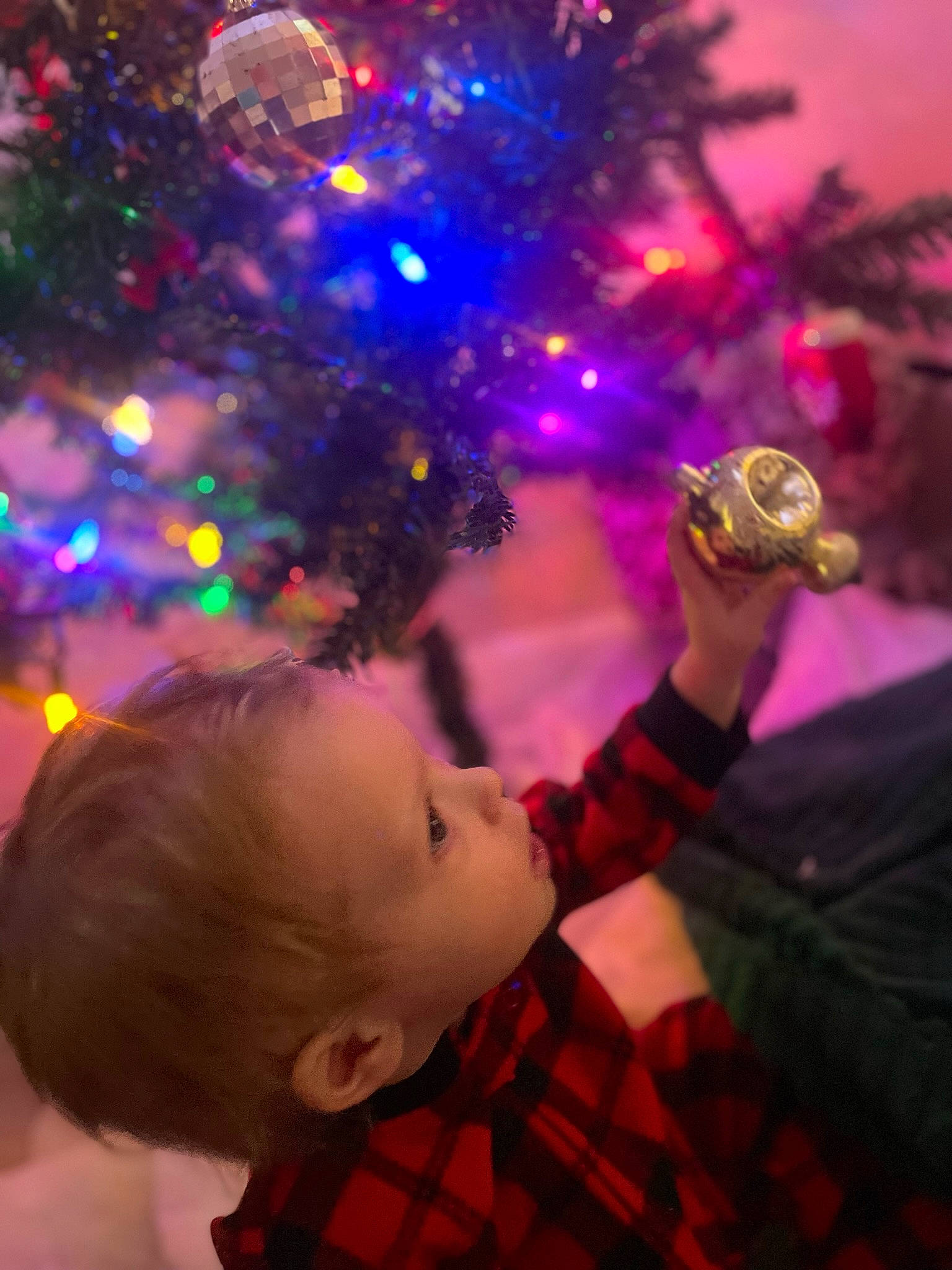Zildjian is registered to the contest to win money with this photo: christmas, christmas_decoration, christmas_eve, christmas_ornament, christmas_tree, event, evergreen, fun, happy, holiday, holiday_ornament, light, ornament, person, plaid, plant, purple, tartan, toddler, tradition