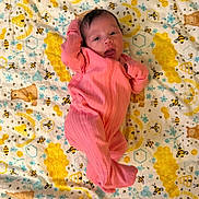 Jasmine joined the competition — help win amazing prizes! baby, newborn, infant, blanket, pink_sleeper, bee_pattern, honeycomb, teddy_bear, floral, lying_down, open_mouth, baby_hair, one_person, cozy, soft_texture, footed_pajamas, portrait, cute, gaze_upward, nursery