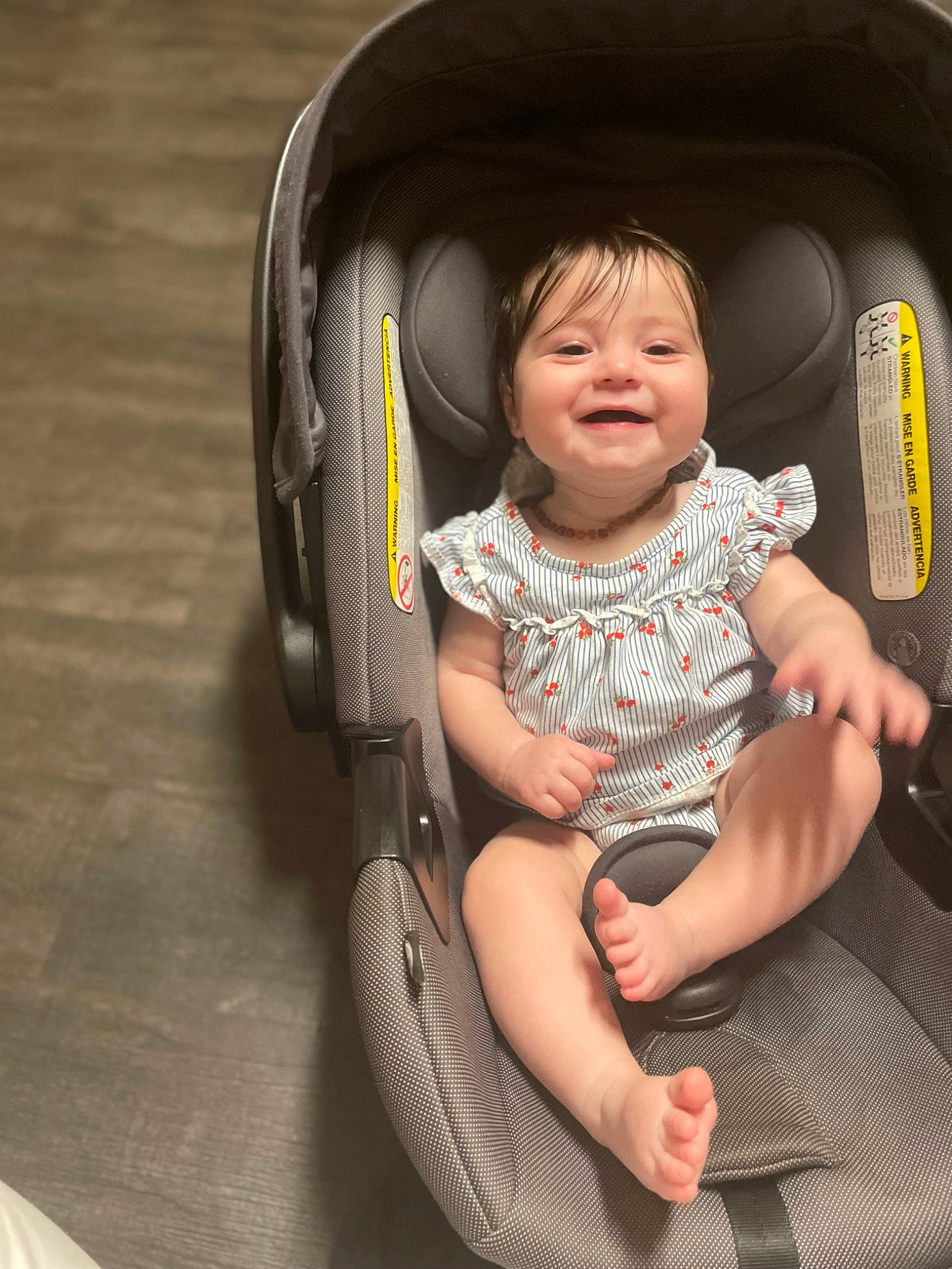 Eddynn is registered to the contest to win money with this photo: auto_part, automotive_design, baby, baby_carriage, baby_products, baby_toddler_clothing, car_seat, child, comfort, flash_photography, fun, happy, joy, lap, pattern, person, sitting, smile, steering_wheel, thigh