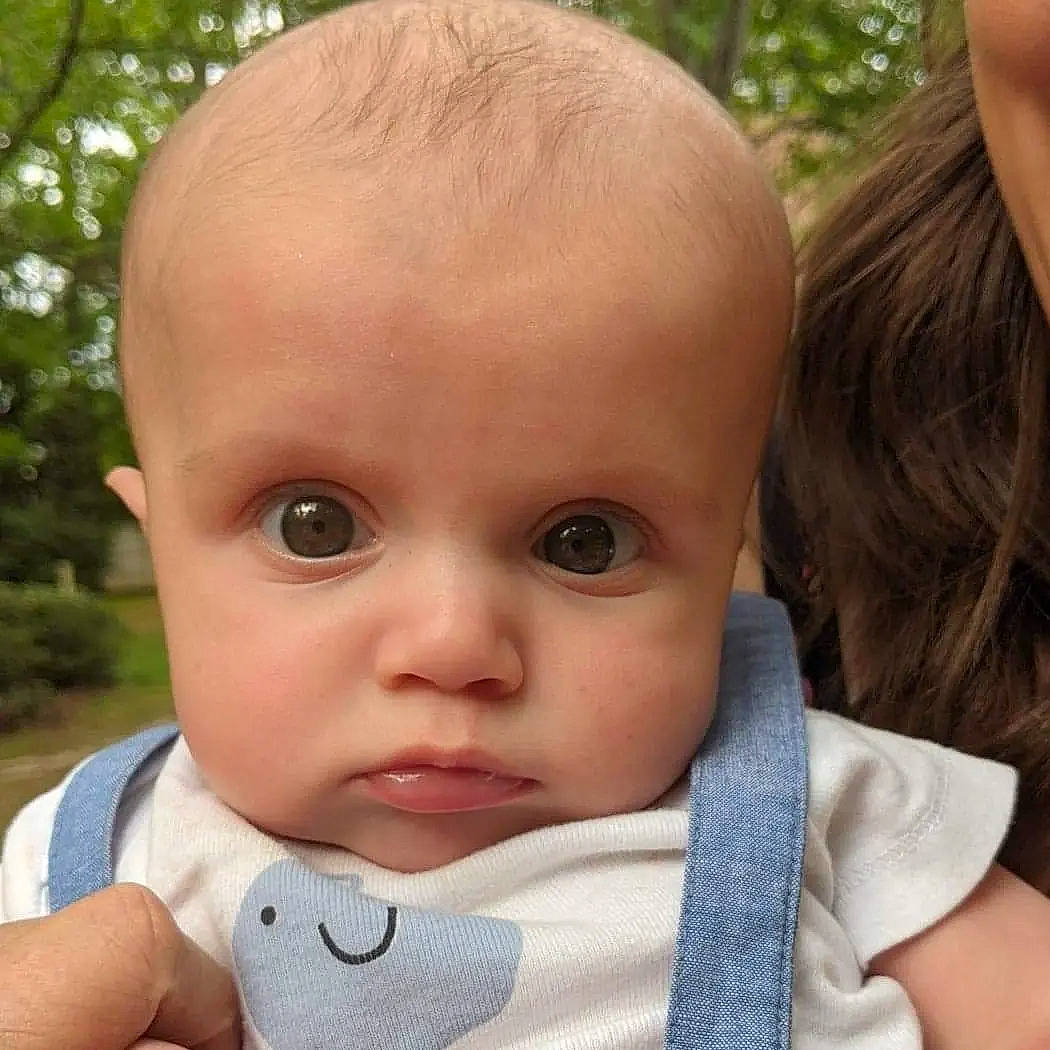 Cale joined the competition — help win amazing prizes! baby, baby_toddler_clothing, cheek, chin, close_up, ear, eyelash, fun, gesture, grass, happy, iris, lip, mouth, nose, person, plant, skin, thumb, toddler