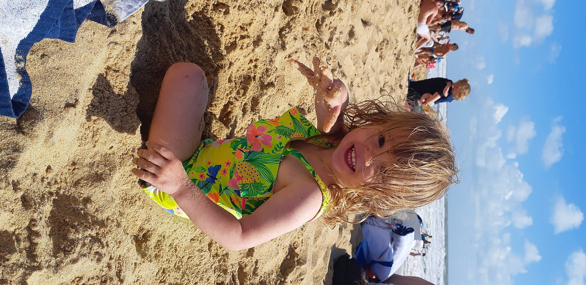 Isabella participe au concours pour gagner de l'argent avec cette photo : adaptation, arm, beach, blue, body_of_water, cloud, fun, happy, human_leg, joy, leisure, people_in_nature, people_on_beach, person, recreation, sand, sky, smile, summer, thigh