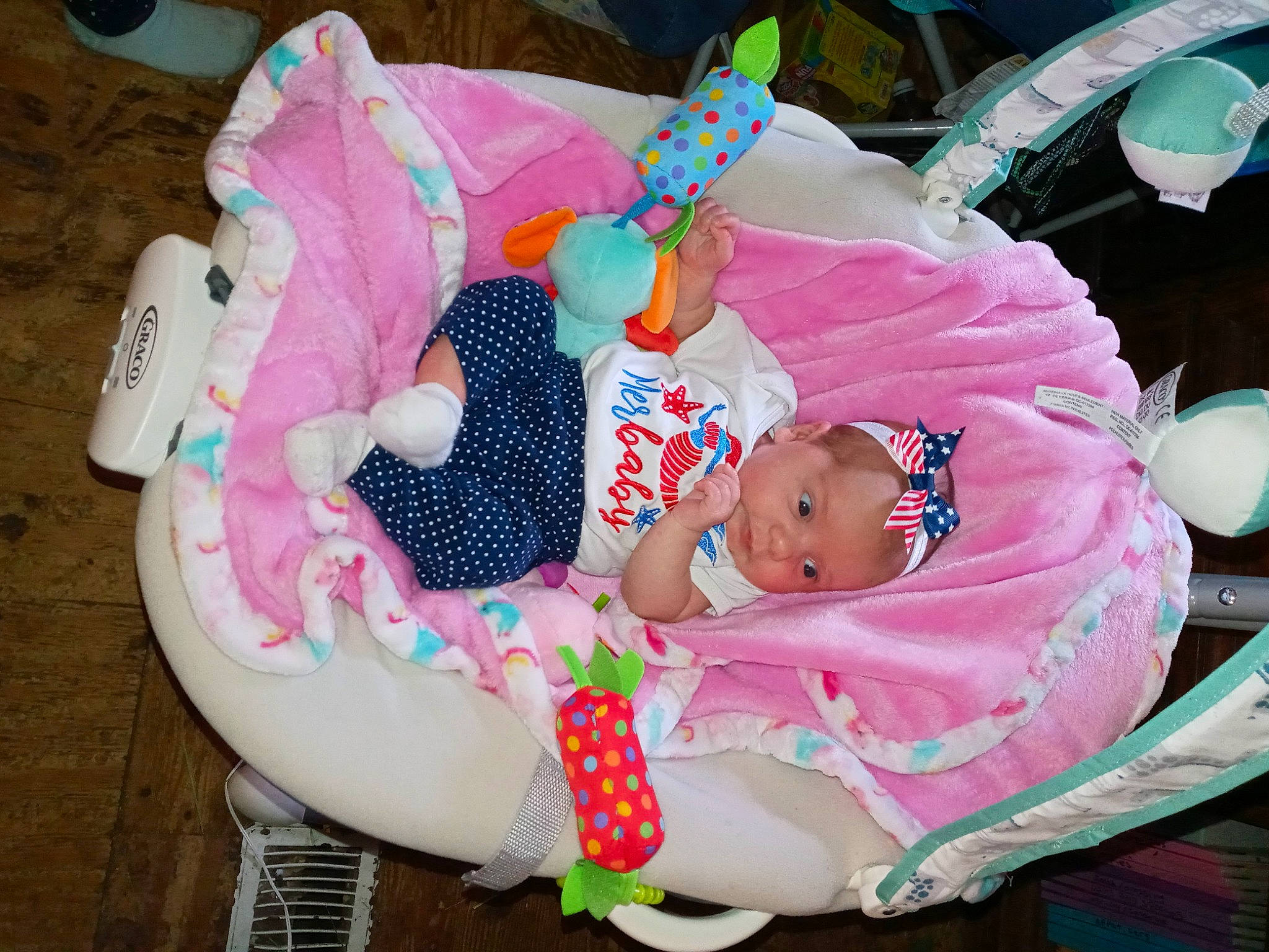 Delaney joined the competition — help win amazing prizes! baby, baby_products, baby_toddler_clothing, child, comfort, event, fun, lap, leisure, magenta, pattern, person, pink, sitting, toddler, white