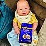Cobe joined the competition — help win amazing prizes! baby, bib, blanket, buttons, cadbury, child, chocolate_bag, colorful_socks, couch, cozy, cute, dairy_milk, happy, indoor, infant, patterned_pants, pillow, seated, smiling, yellow_shirt