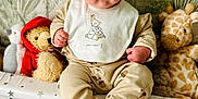 Cobe joined the competition — help win amazing prizes! acorn_pattern, baby, bib, blue_eyes, child, cozy, cute, giraffe_toy, indoor, infant, pajamas, person, plush_toys, portrait, room, sitting, soft_toys, stars_pattern, teddy_bear, wallpaper