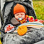 Cobe joined the competition — help win amazing prizes! autumn, baby, blanket, child, cozy, cute, fall, infant, nature, orange_hat, outdoor, pacifier, plush_toy, portrait, pumpkin, relaxing, seasonal, stroller, toy, warm_clothing