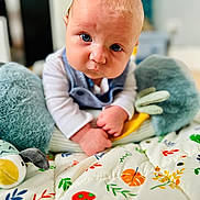 Cobe joined the competition — help win amazing prizes! baby, infant, blue_eyes, plush_toy, blanket, colorful, pattern, cute, portrait, indoors, child, young, clothing, soft, hand, lying_down, expression, face, looking_at_camera, closeup