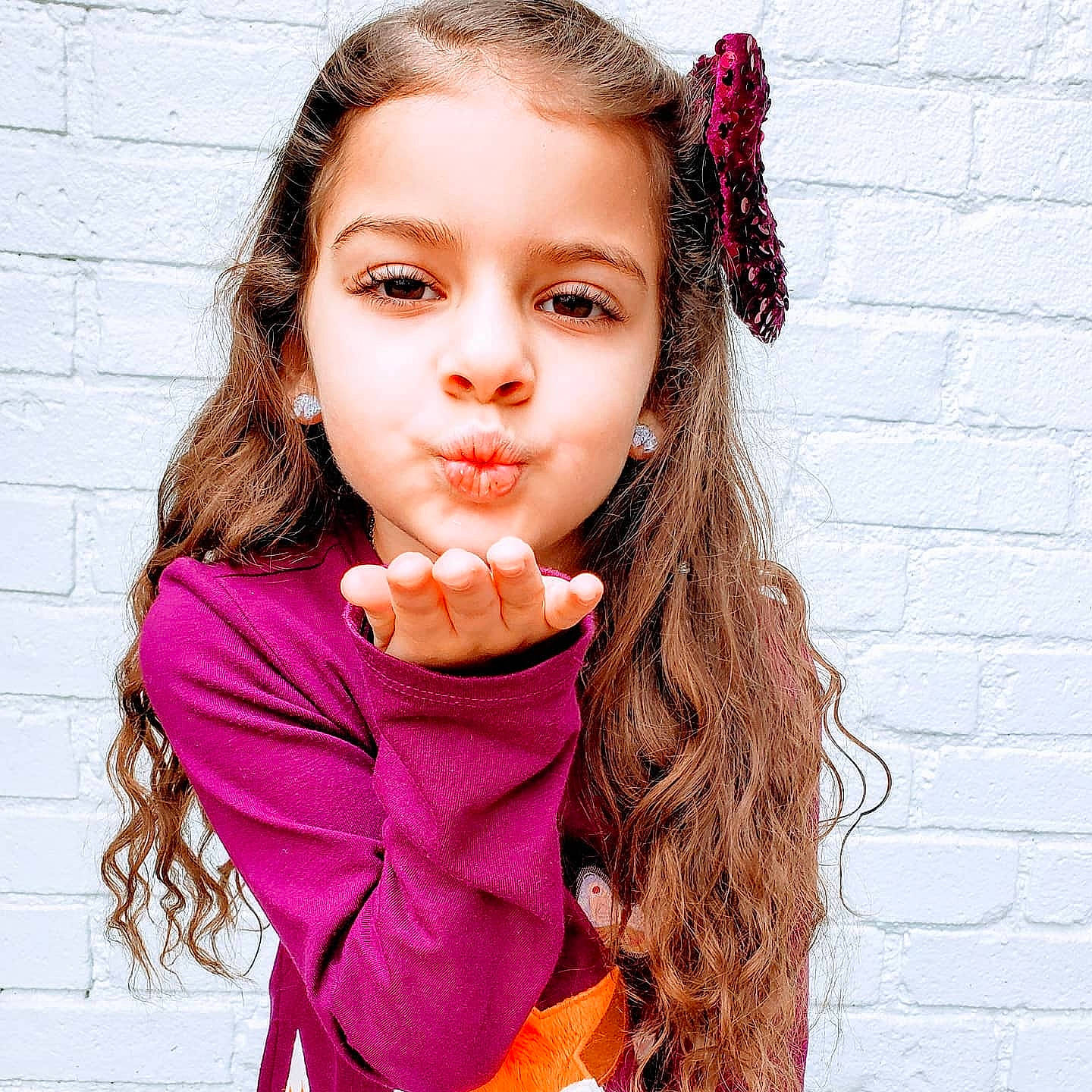 Jocelyn is registered to the contest to win money with this photo: black_hair, cheek, chin, cool, ear, eyebrow, eyelash, flash_photography, gesture, hair, happy, head, lip, neck, nose, outerwear, person, pink, shoulder, skin