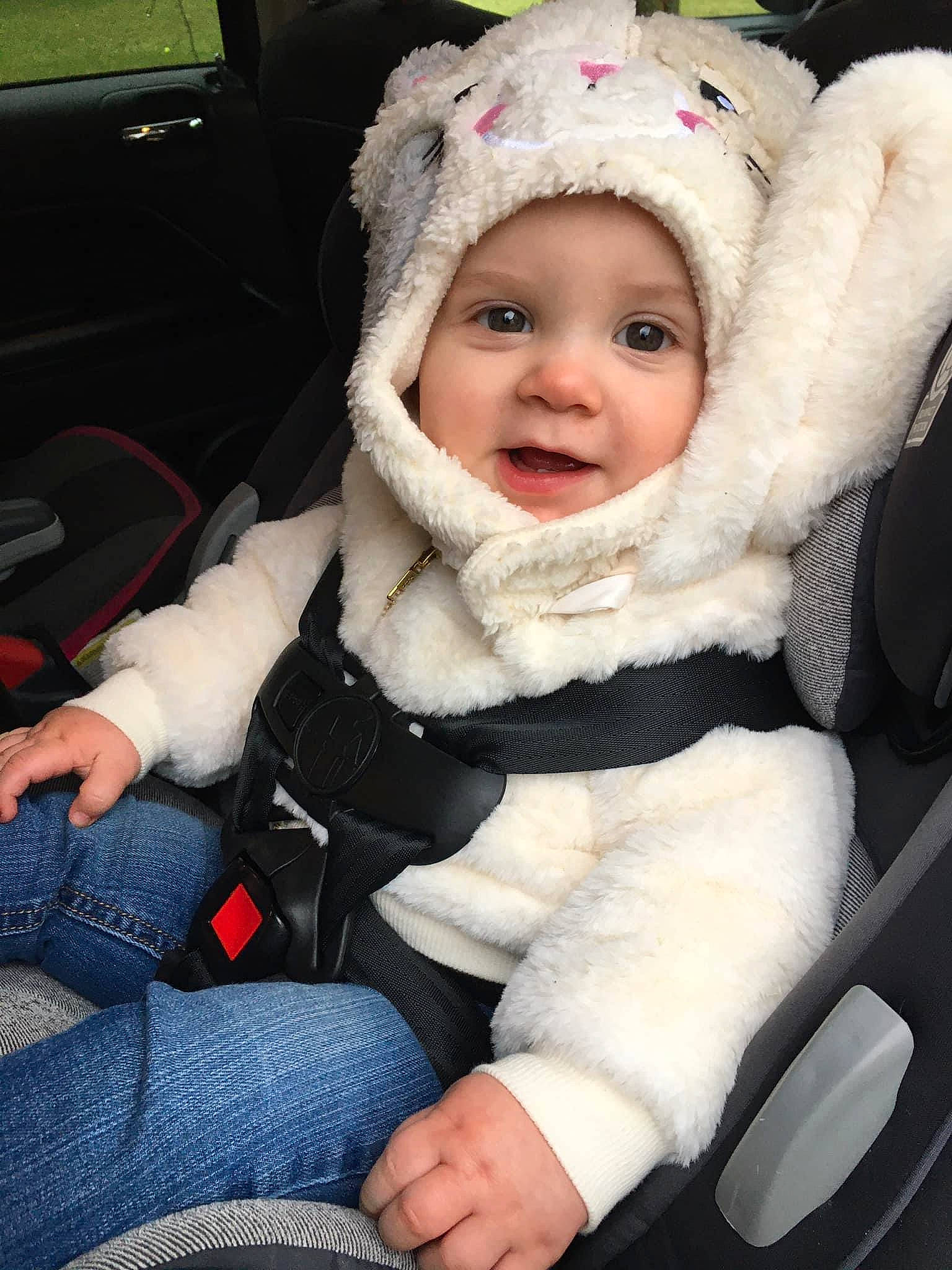 Kynzlee is registered to the contest to win money with this photo: baby, baby_carriage, baby_products, baby_toddler_clothing, cap, car_seat, cheek, child, comfort, eye, finger, fur, fur_clothing, glove, happy, head, headwear, jacket, person, smile