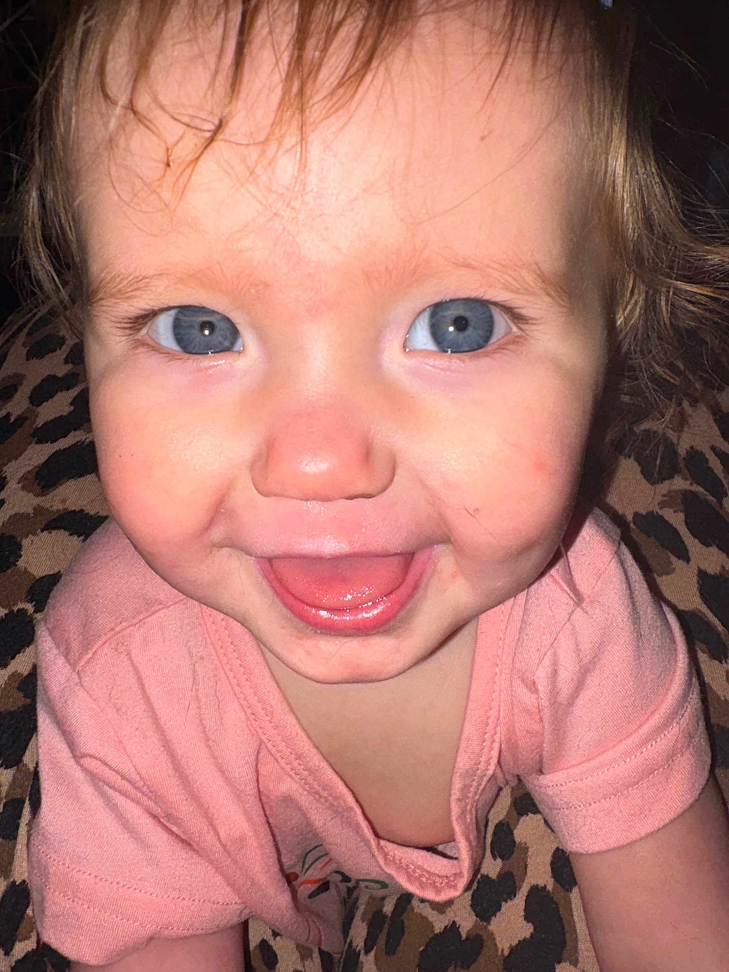 Stormie is registered to the contest to win money with this photo: toddler, child, smiling, blue_eyes, pink_shirt, close_up, face, happy, baby, cute, leopard_print, pattern, skin, mouth_open, cheeks, eyelashes, hair, person, infant, portrait