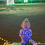 Stormie joined the competition — help win amazing prizes! toddler, child, bench, string_lights, night, outdoor, tree, illumination, festive, happy, clothing, car, parked_vehicle, smile, person, young_child, light, celebration, winter, playful